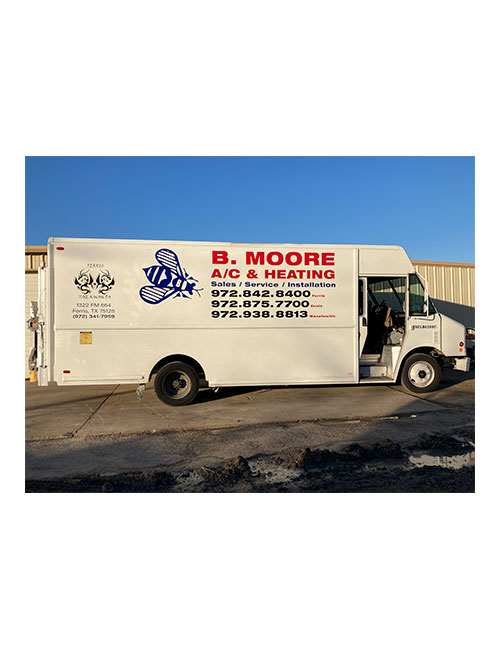 B. Moore A/C vehicle lettering